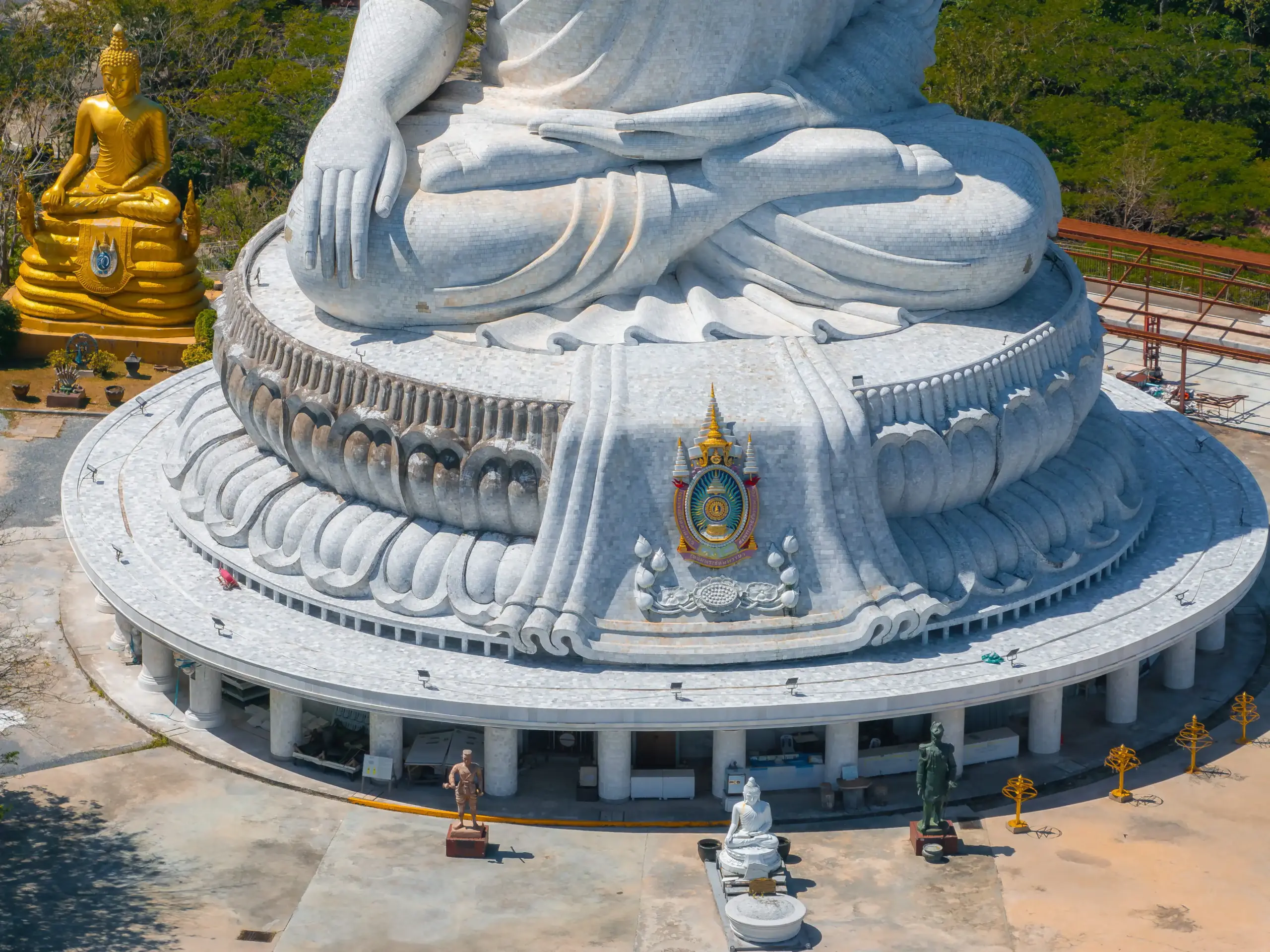 Right hand of the white marble Big Buddha in bhumisparsha mudra, fingertips touching the earth